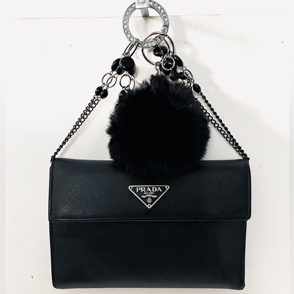 Prada Saffiano Leather Logo Plate medium snap wallet
